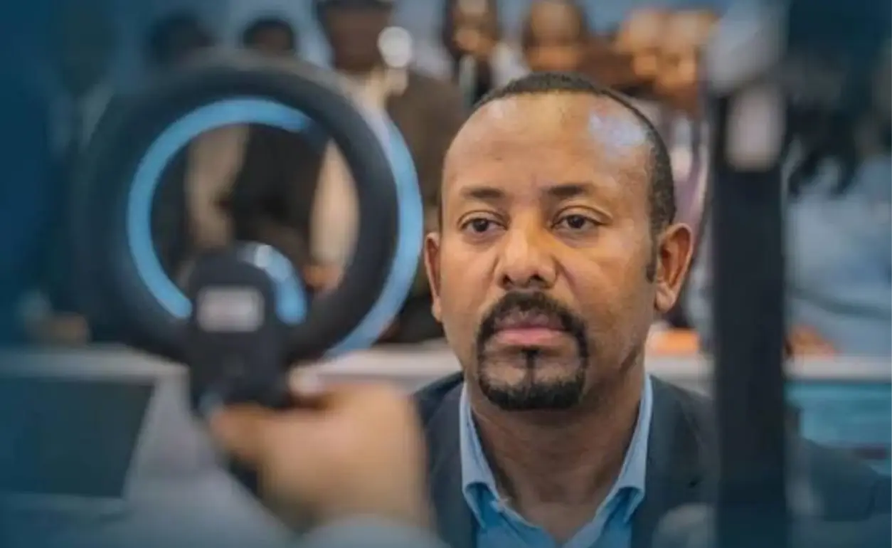 Ethiopian citizens discussing digital identity verification with a public-service adviser